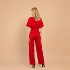 Dames jumpsuit met strik in de taille en wijde pijpen Jelle Jora Mode