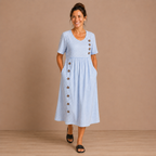 Dames gestreepte midi-jurk met zakken en knoopdetails Jelle Jora Mode