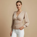 Chique Crop Top met V-hals en Strik Aan De Achterkant Jelle Jora Mode